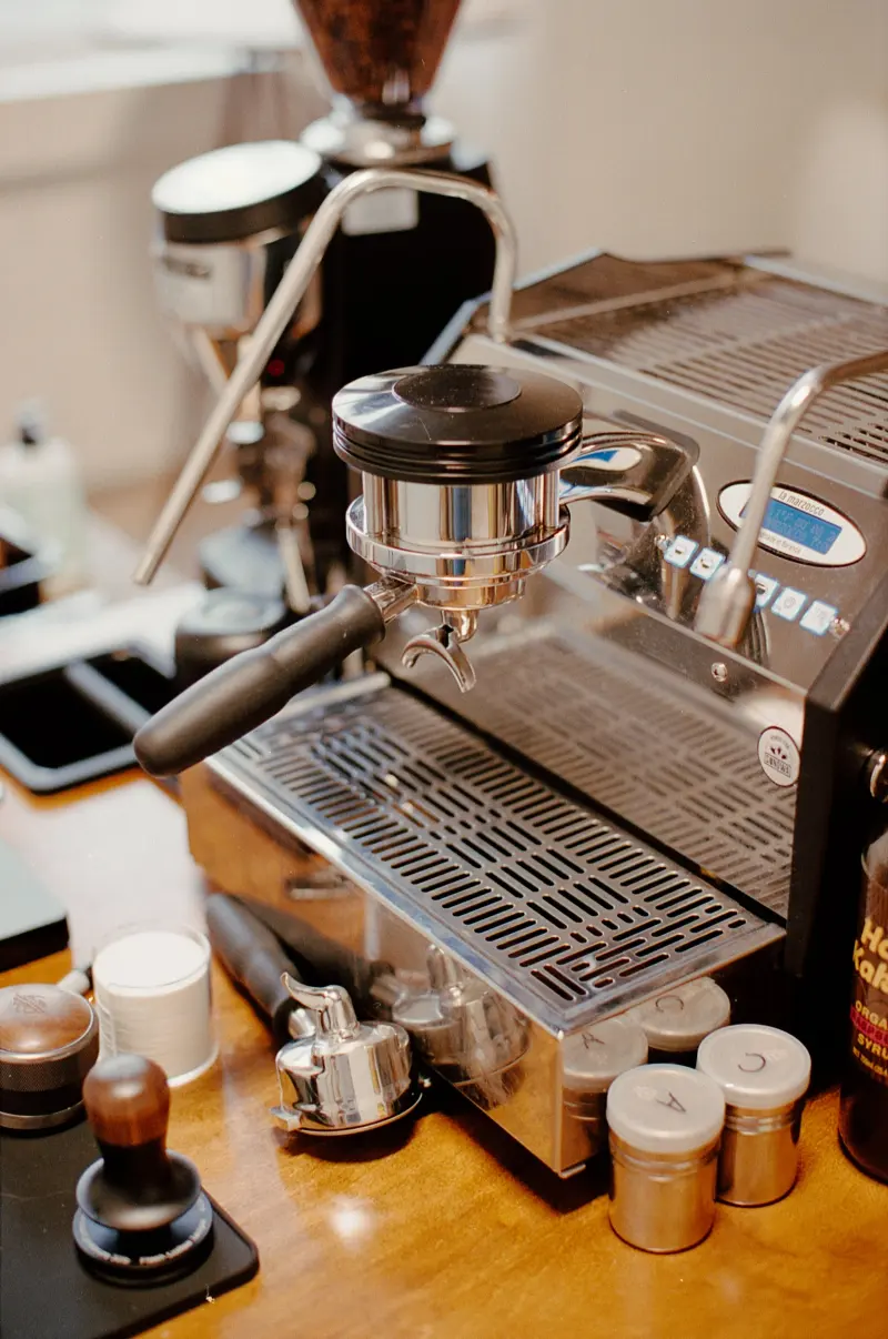 The espresso machine, dialed in: portafilter and warm wood